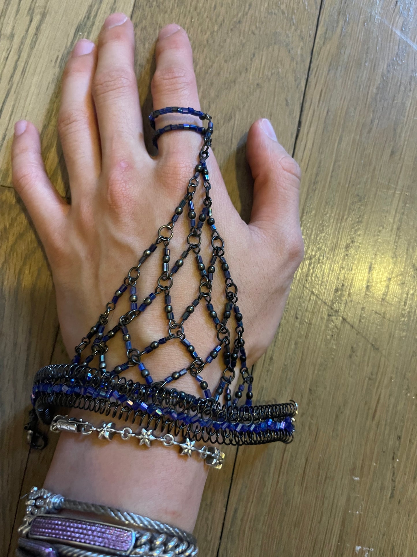 Beaded hand ring