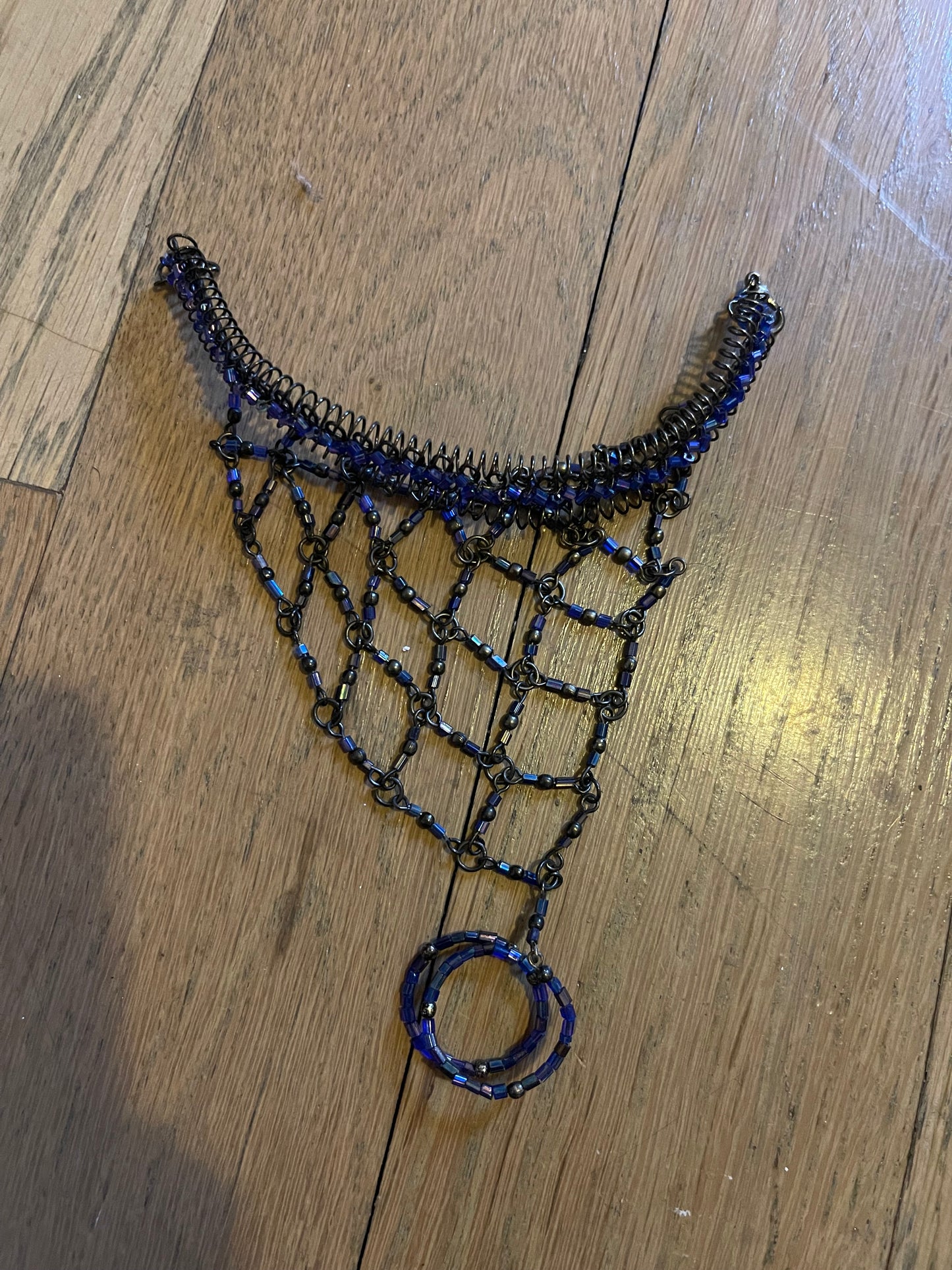 Beaded hand ring
