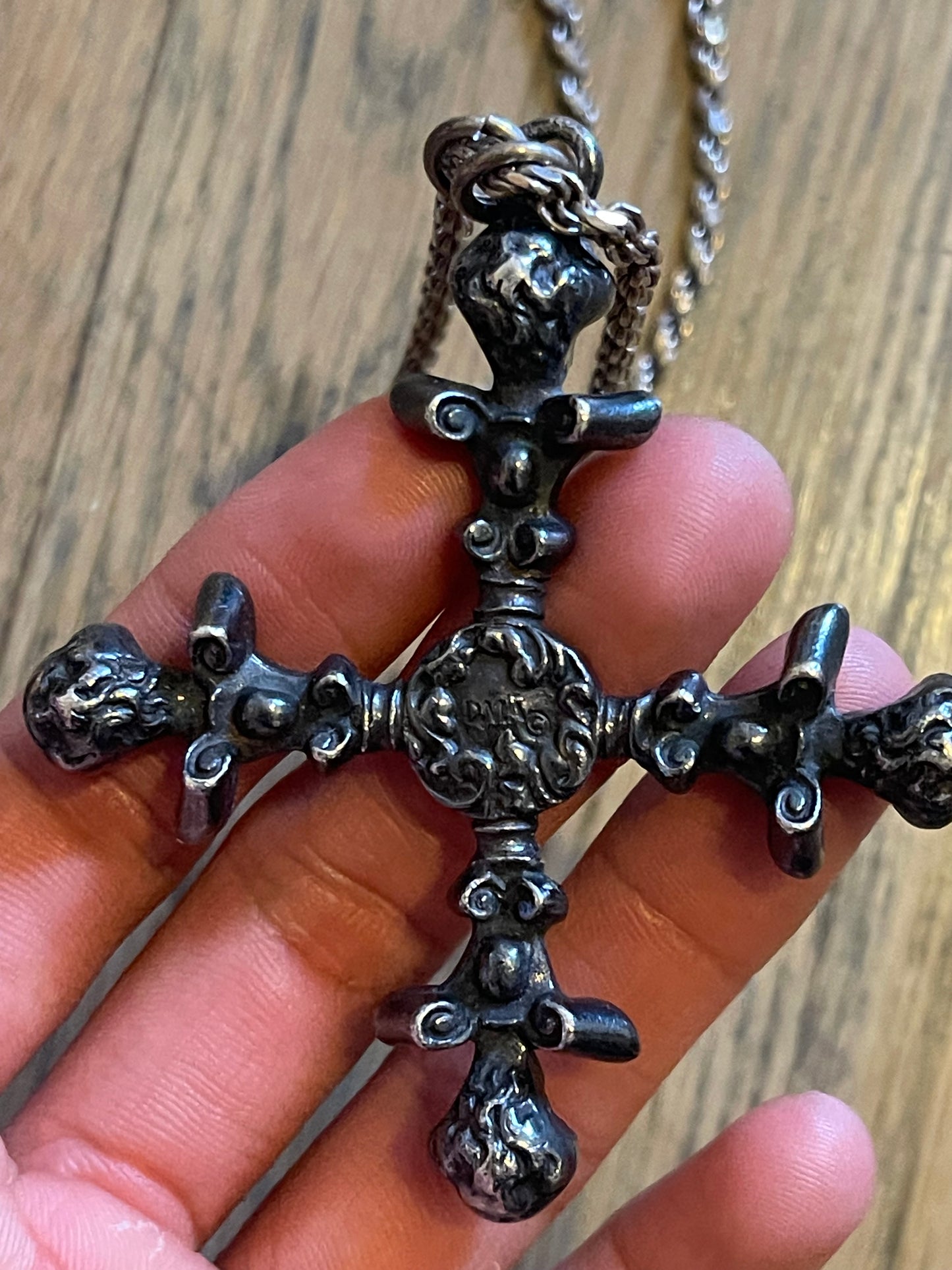 4 headed cherub cross