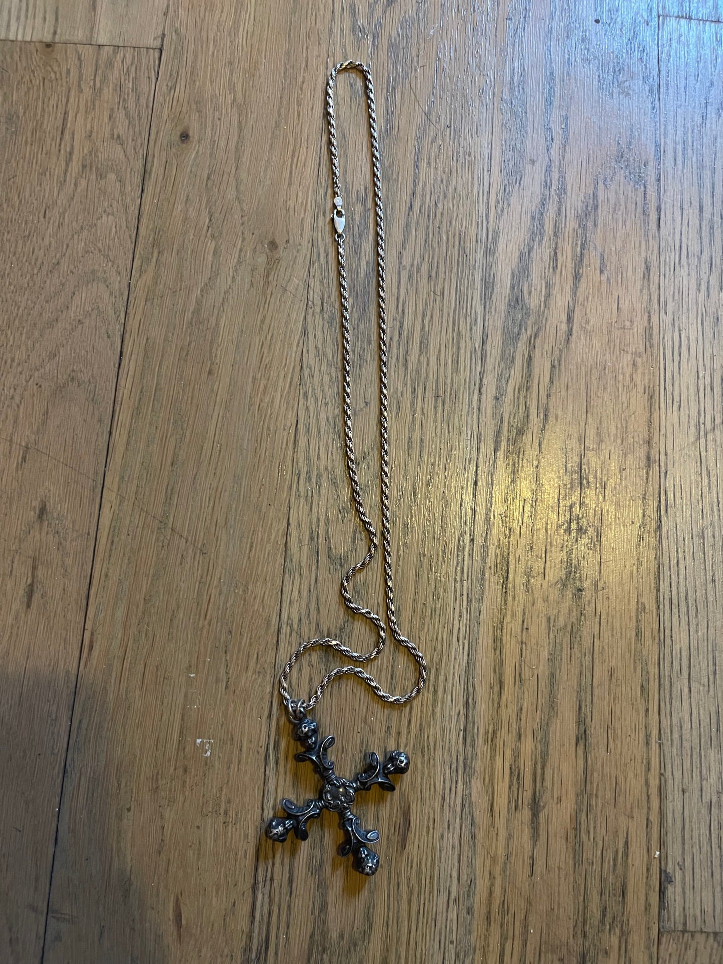 4 headed cherub cross