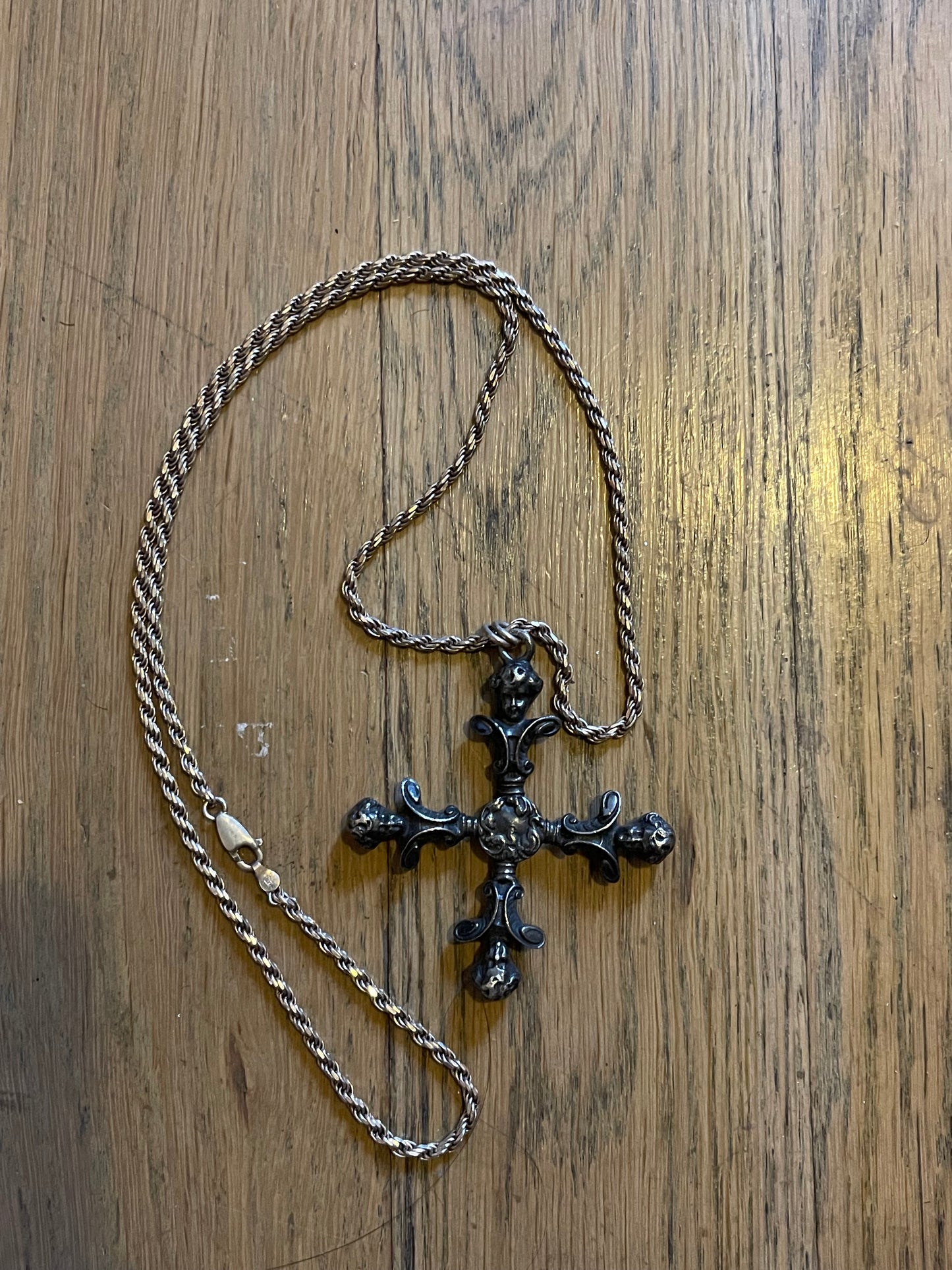 4 headed cherub cross
