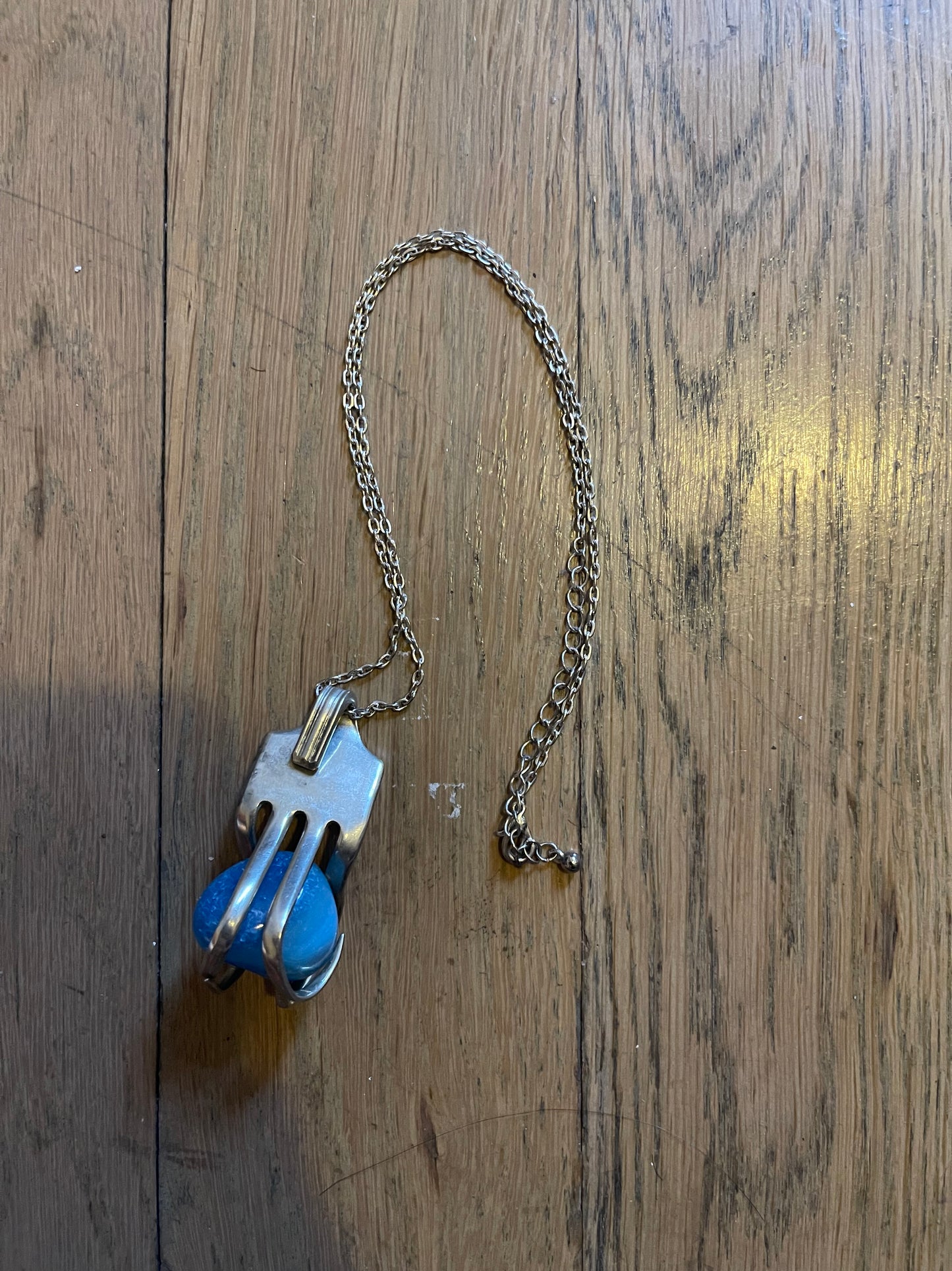 Silver fork and gem necklace