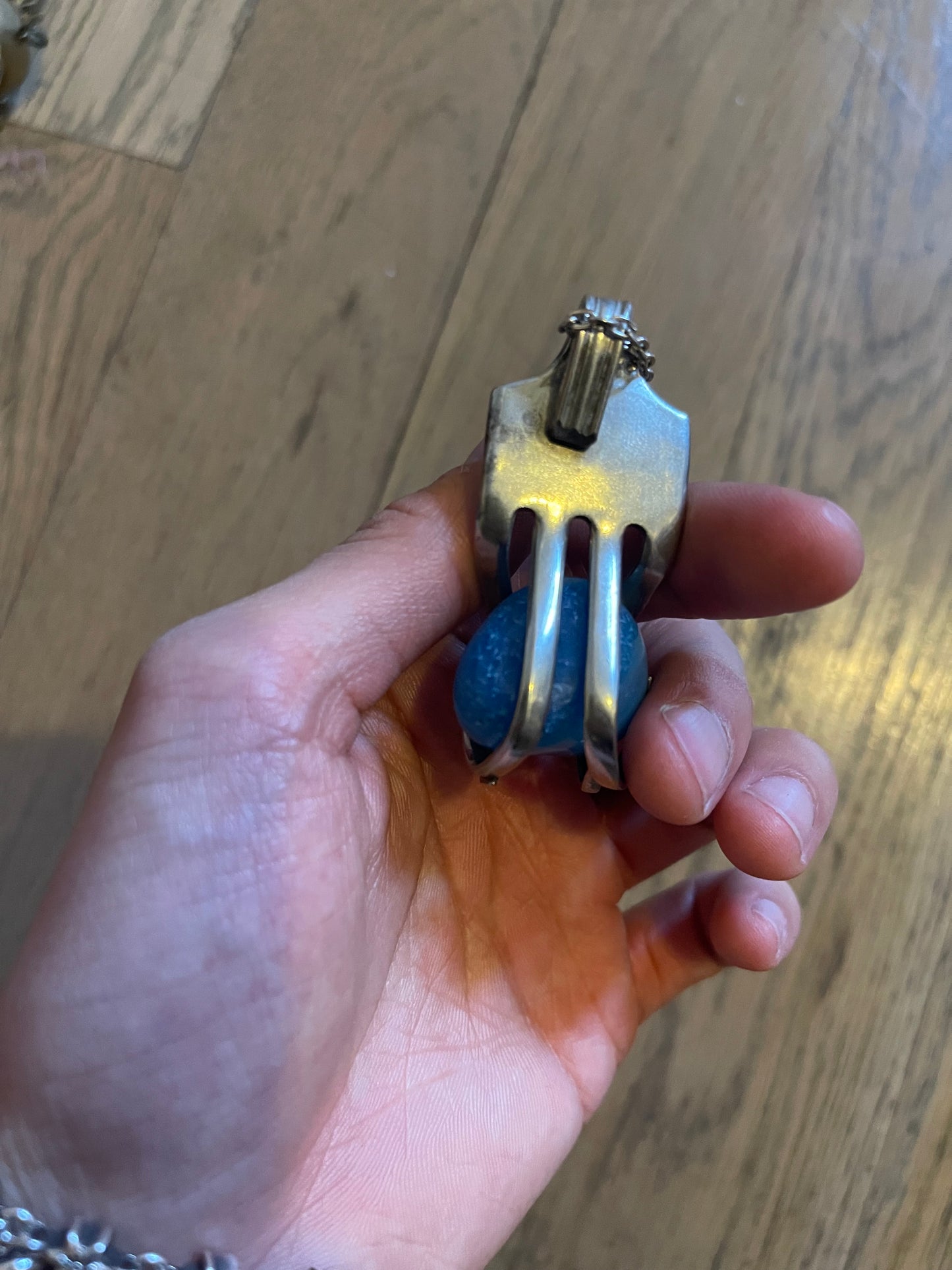 Silver fork and gem necklace