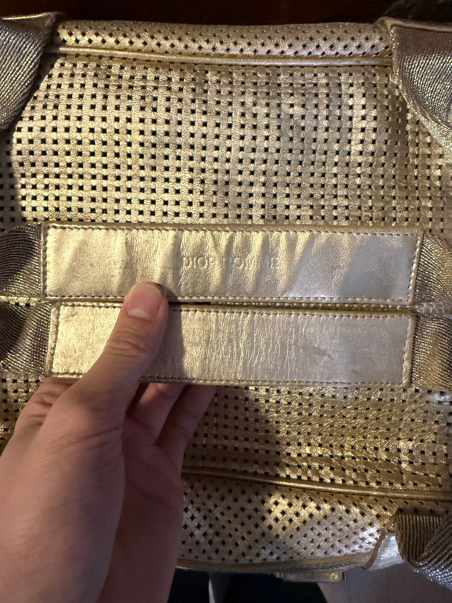 Dior Homme SS06 perforated gold leather duffle bag