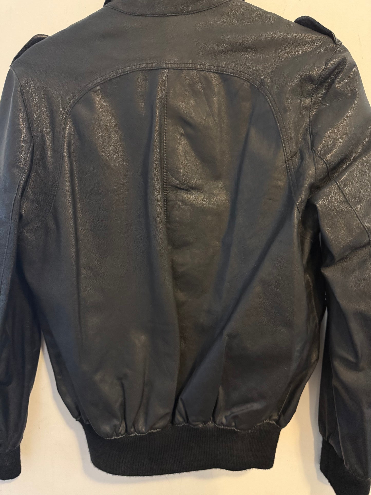 Hedi referenced Dior leather jacket