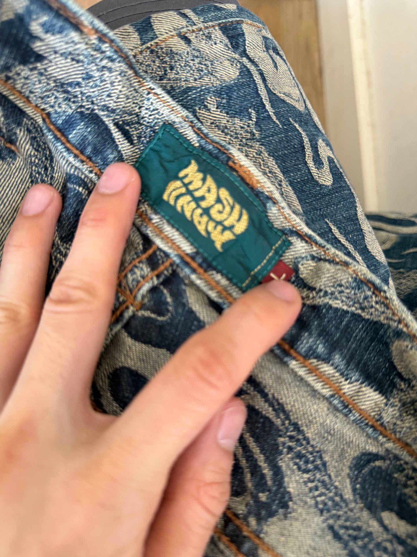 jacquard print all over denim pants