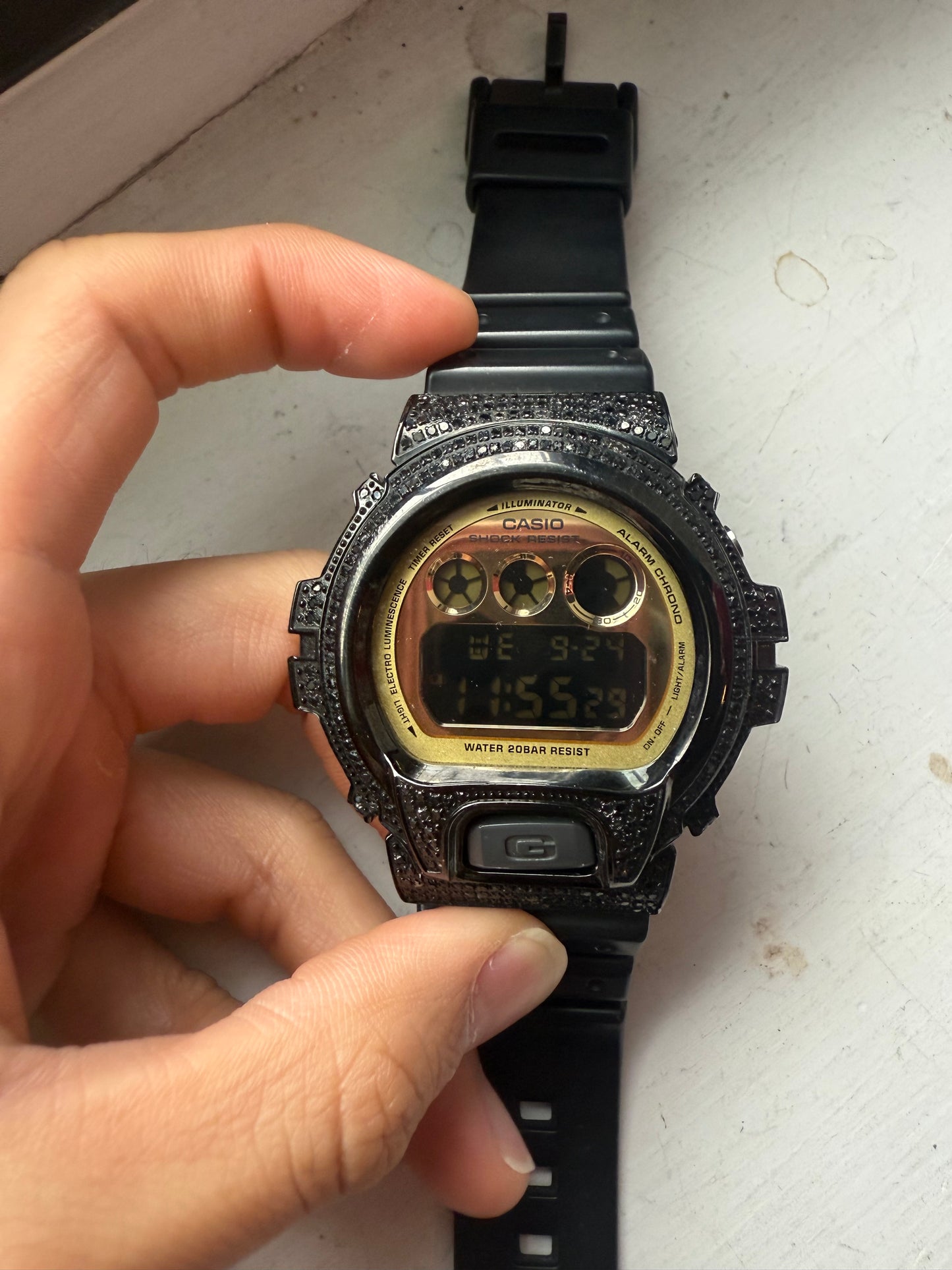 Iced out black diamond g shock DW-6900CB watch