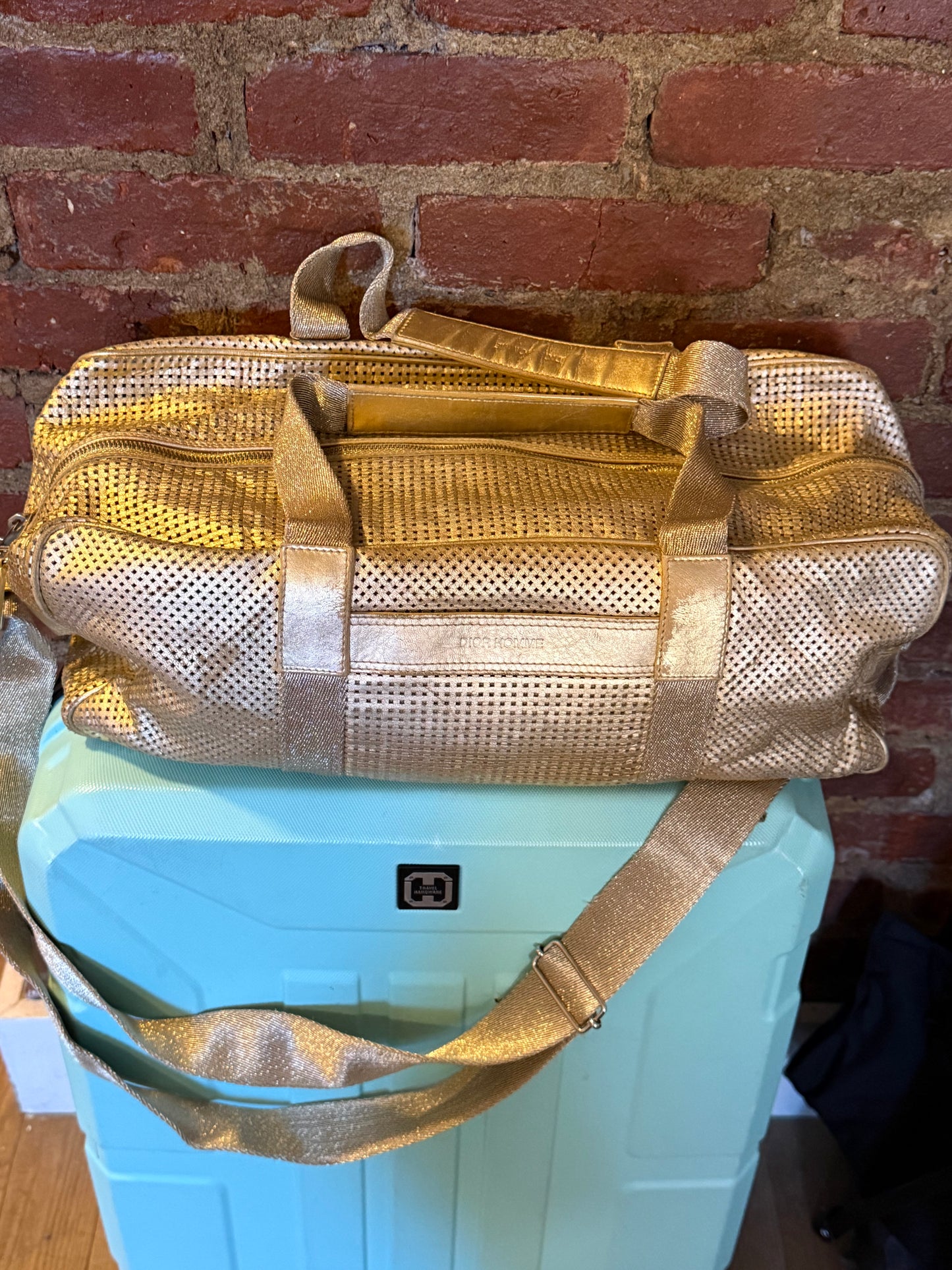 Dior Homme SS06 perforated gold leather duffle bag