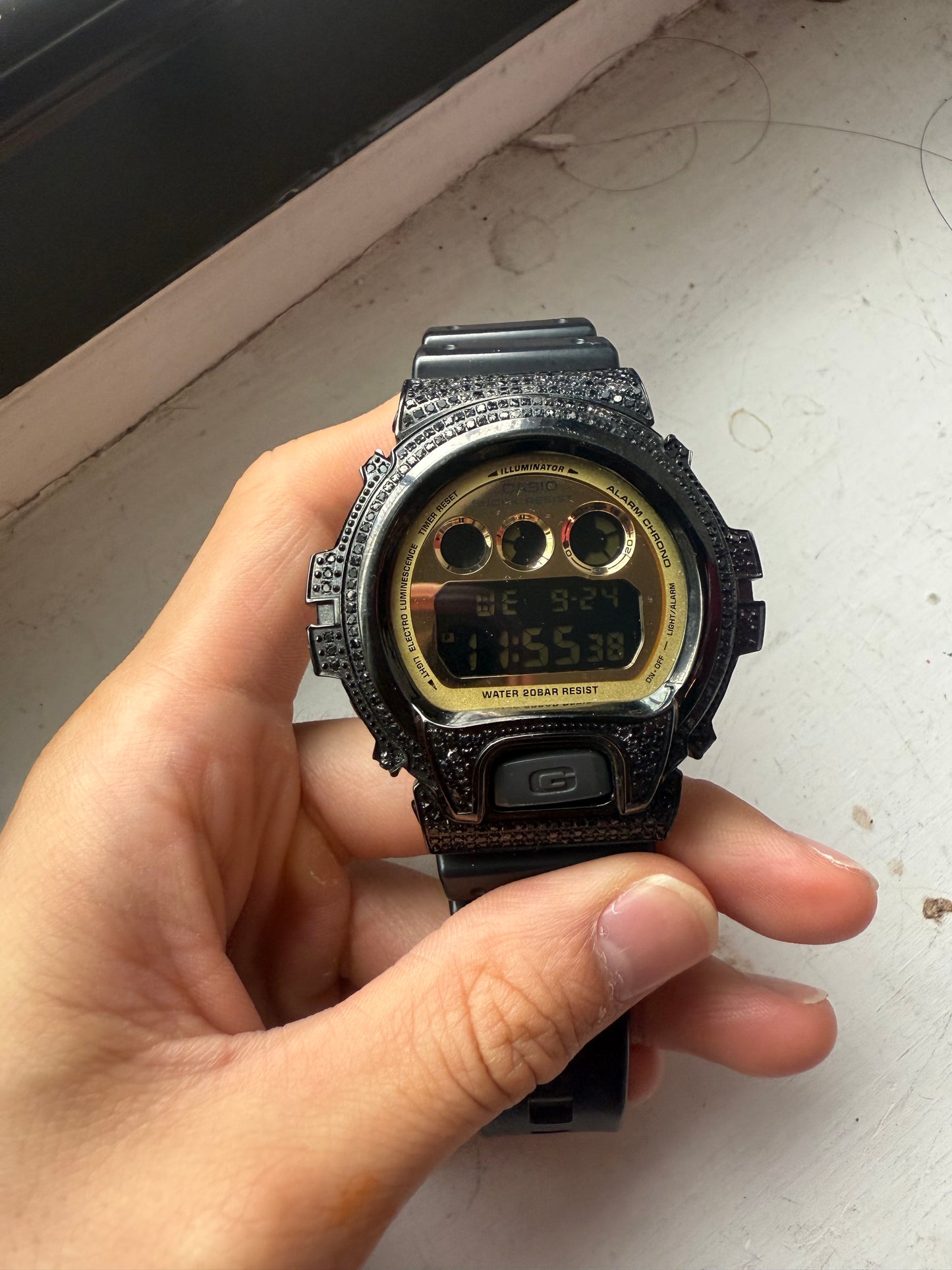 Iced out black diamond g shock DW-6900CB watch