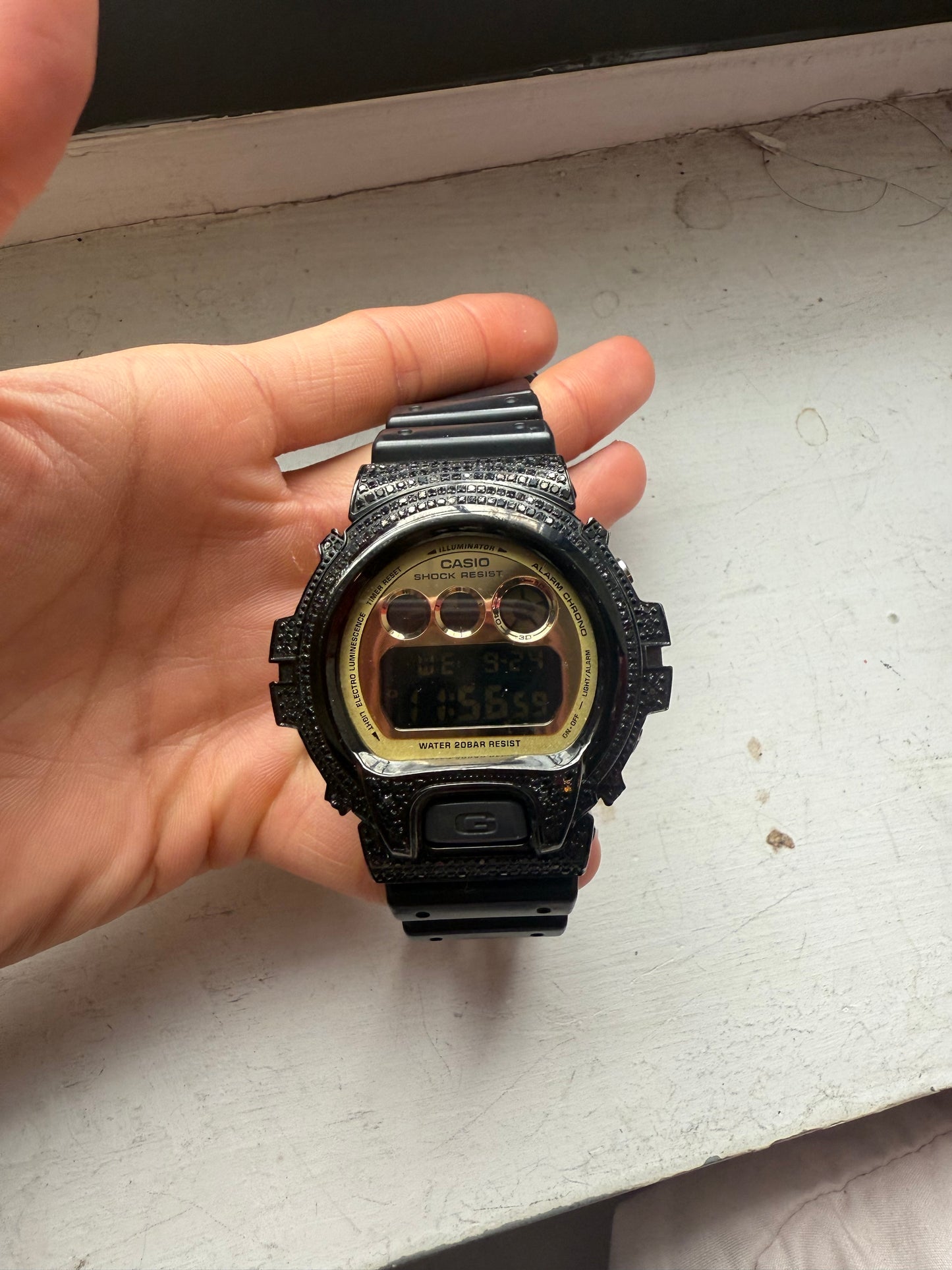 Iced out black diamond g shock DW-6900CB watch