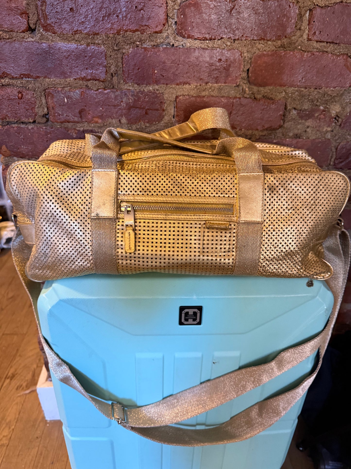 Dior Homme SS06 perforated gold leather duffle bag