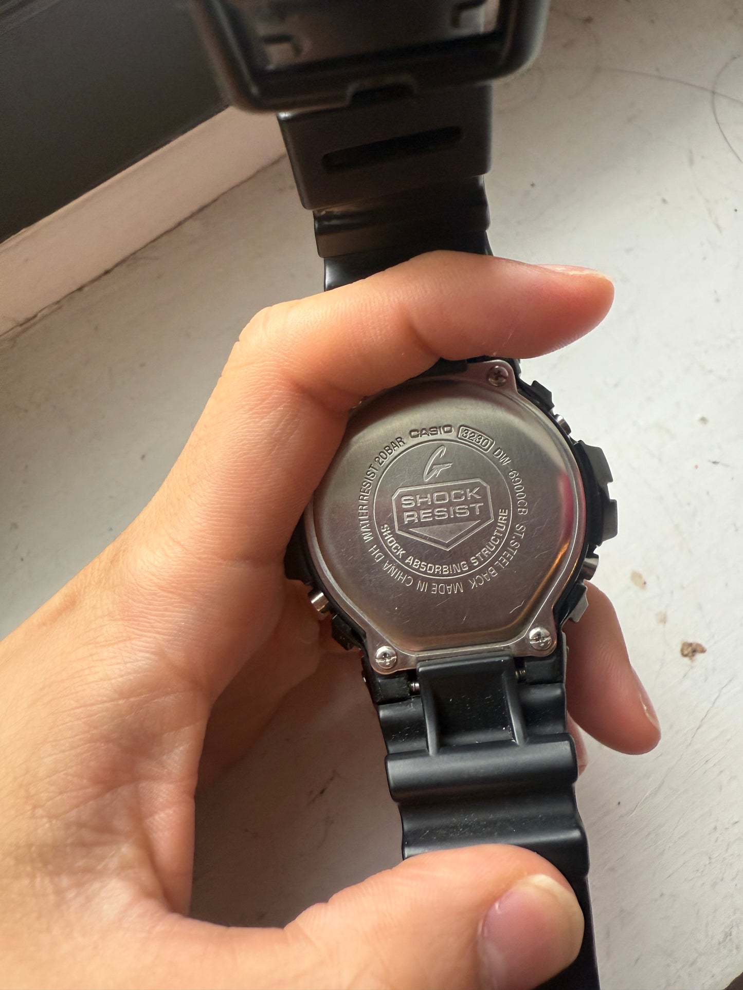 Iced out black diamond g shock DW-6900CB watch