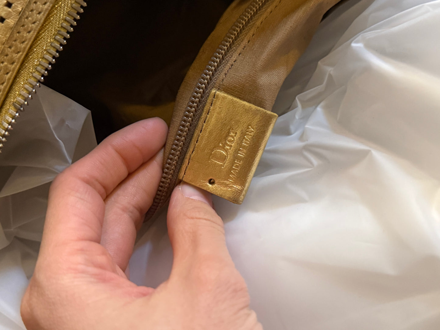 Dior Homme SS06 perforated gold leather duffle bag